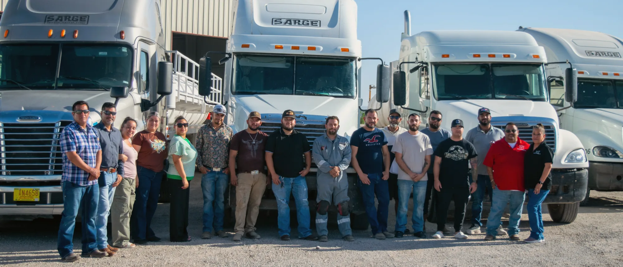 The Sarge Trucking team in front of the fleet